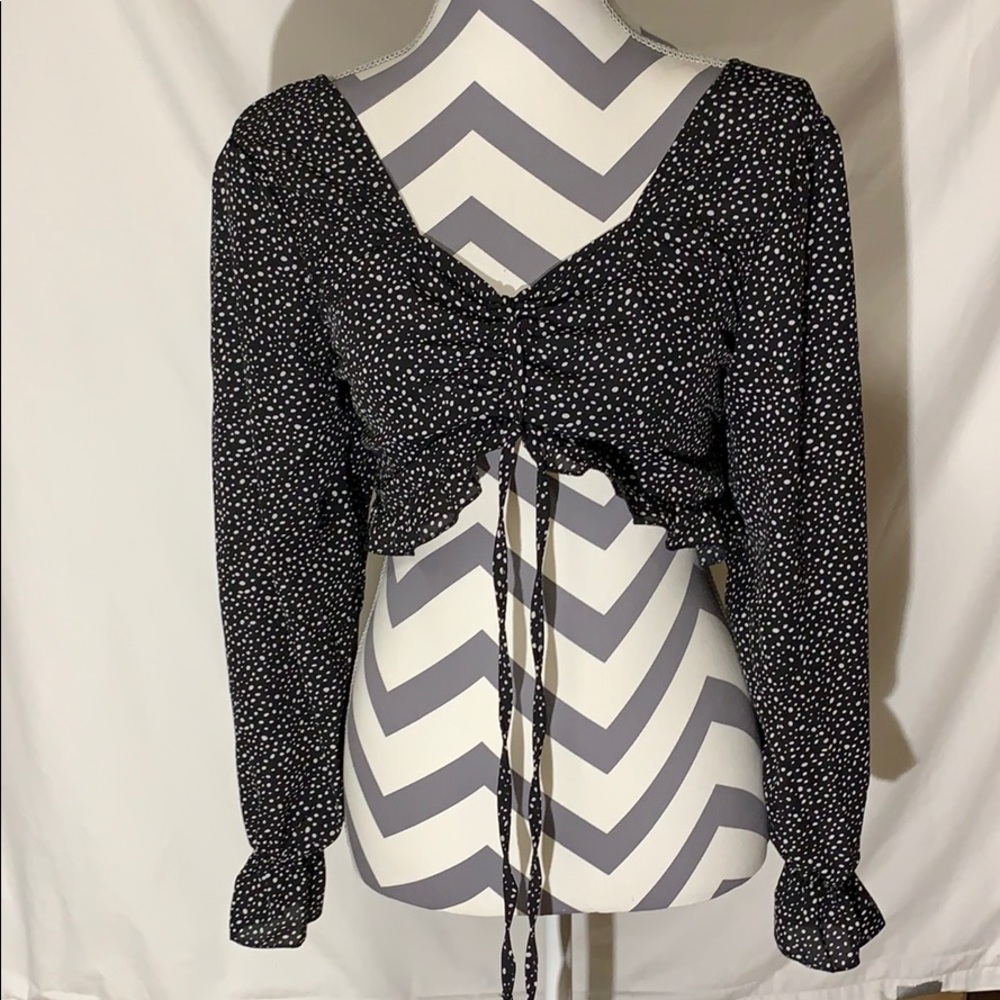 Black and white polka dot long sleeved blouse